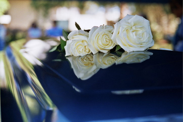 Flowers on funeral coffin